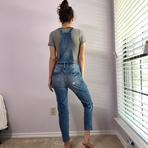 Express lightly distressed relaxed denim overalls
